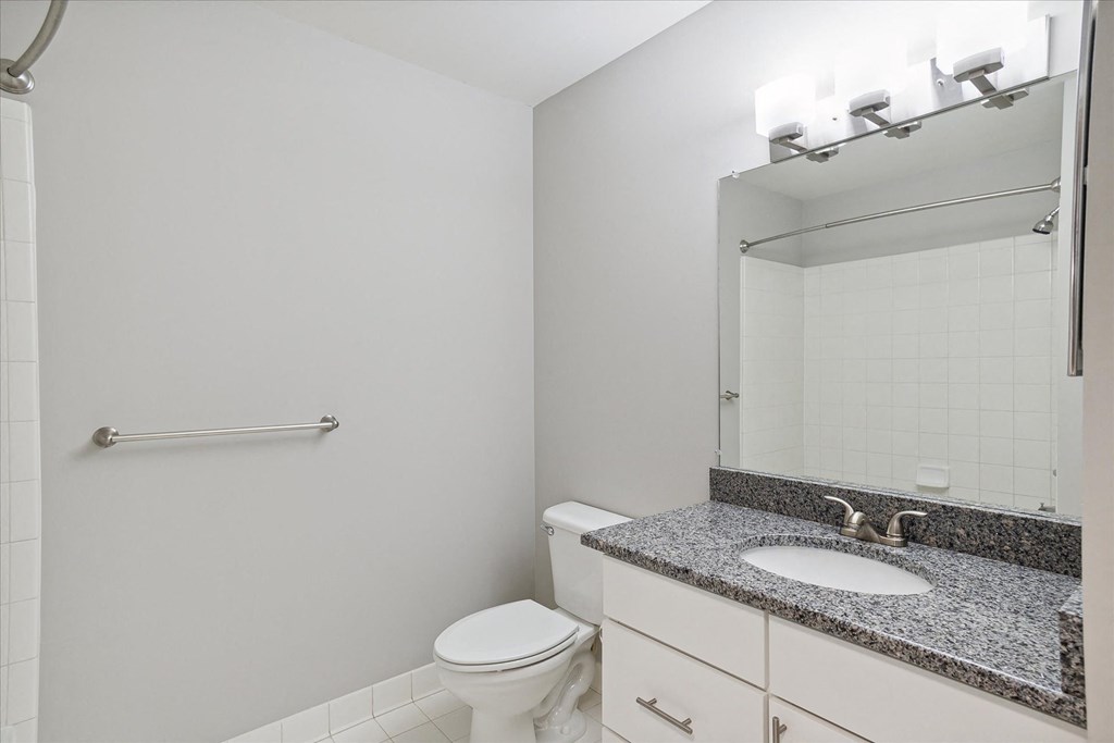 Bathroom With Granite Vanities