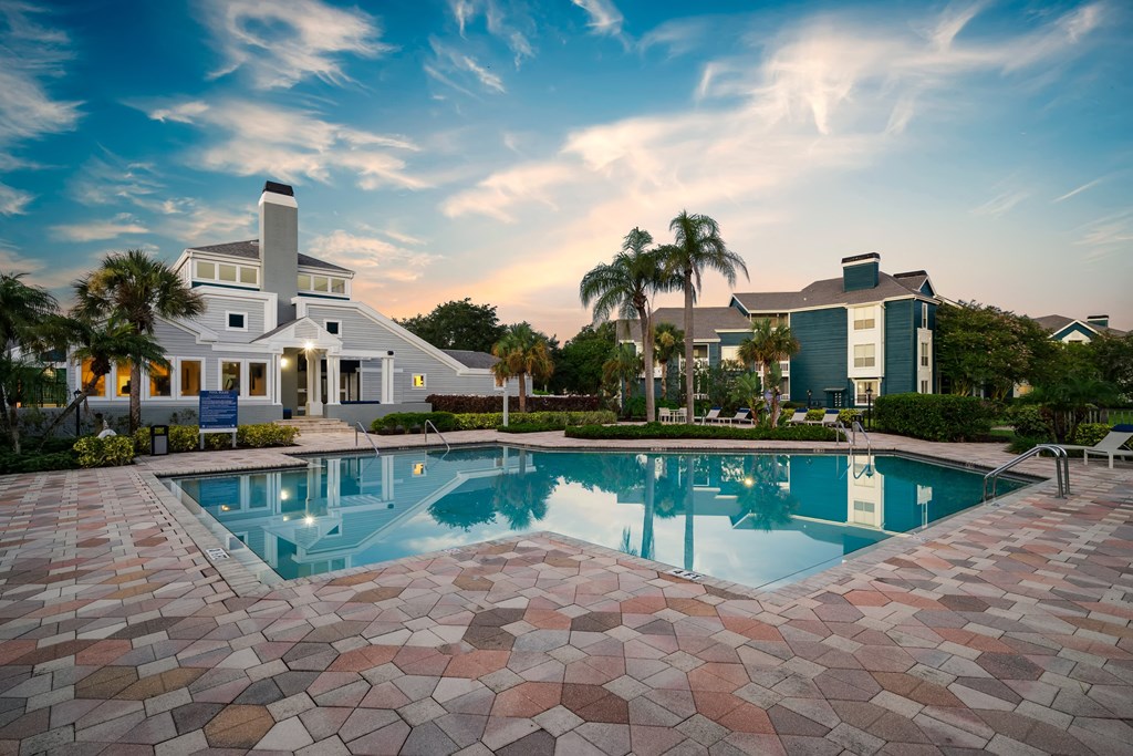 Clubhouse Overlooking The Pool & Sundeck At Twilight