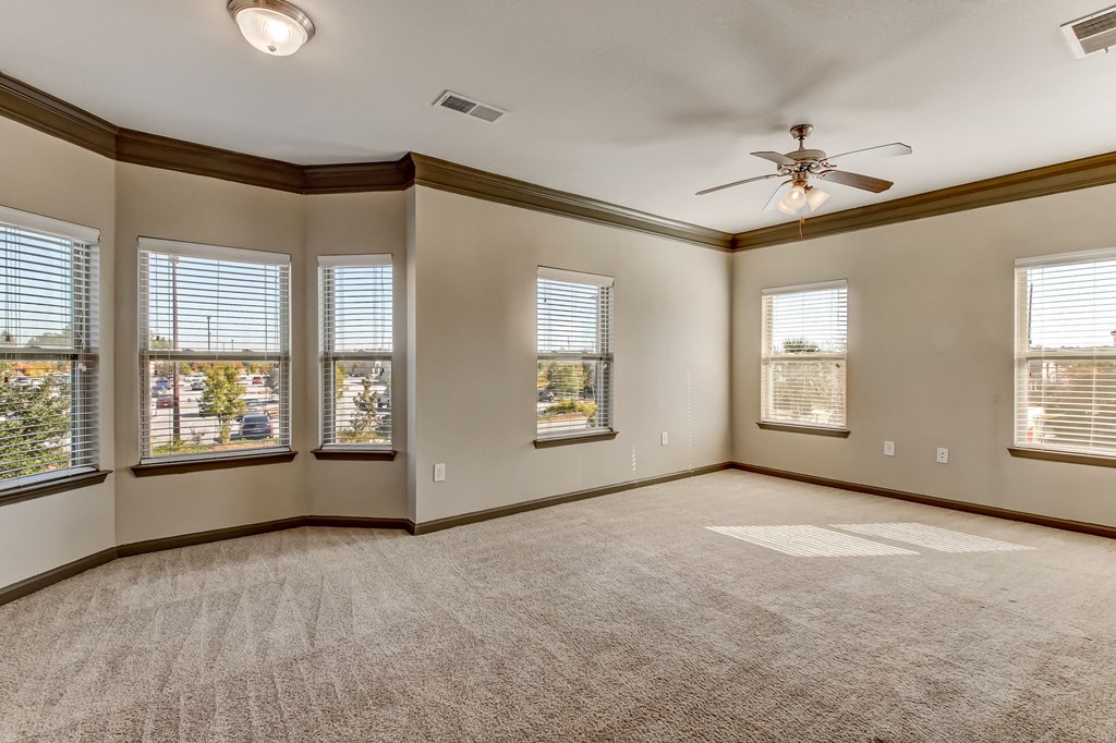 Spacious Living Area with Carpet