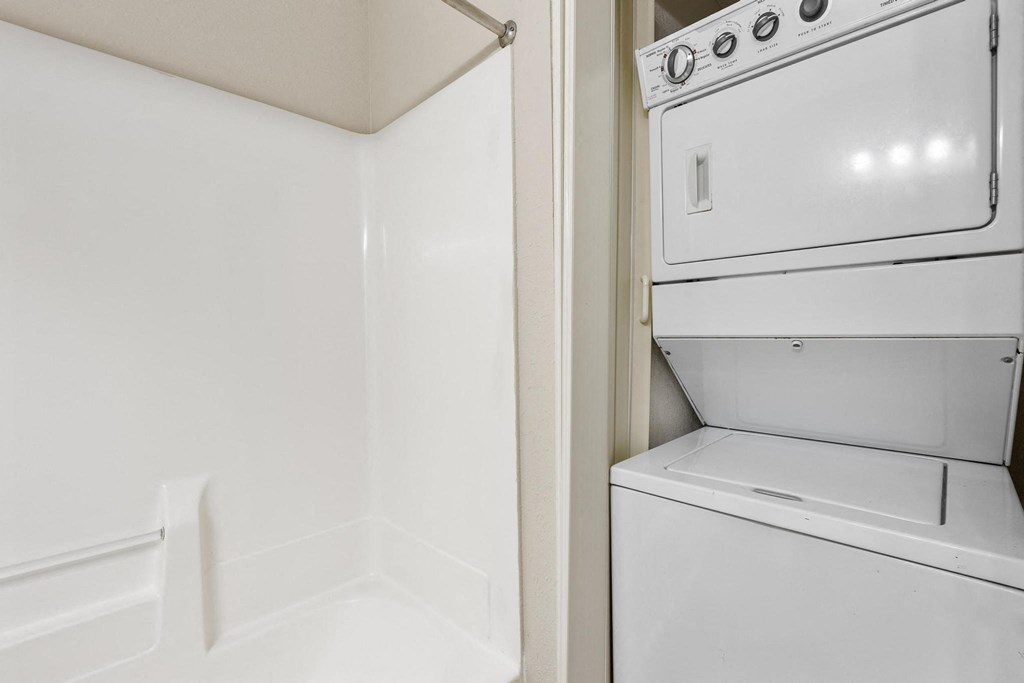 Stackable W/D next to Shower