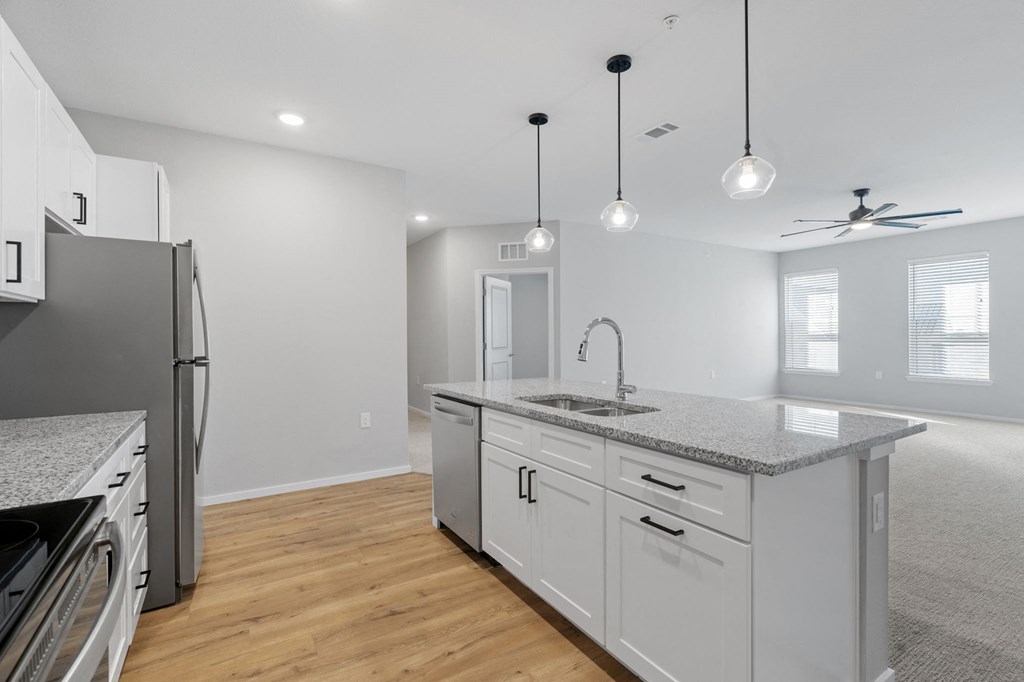 Kitchen with White Cabinetry and Stainless Steel Appliances