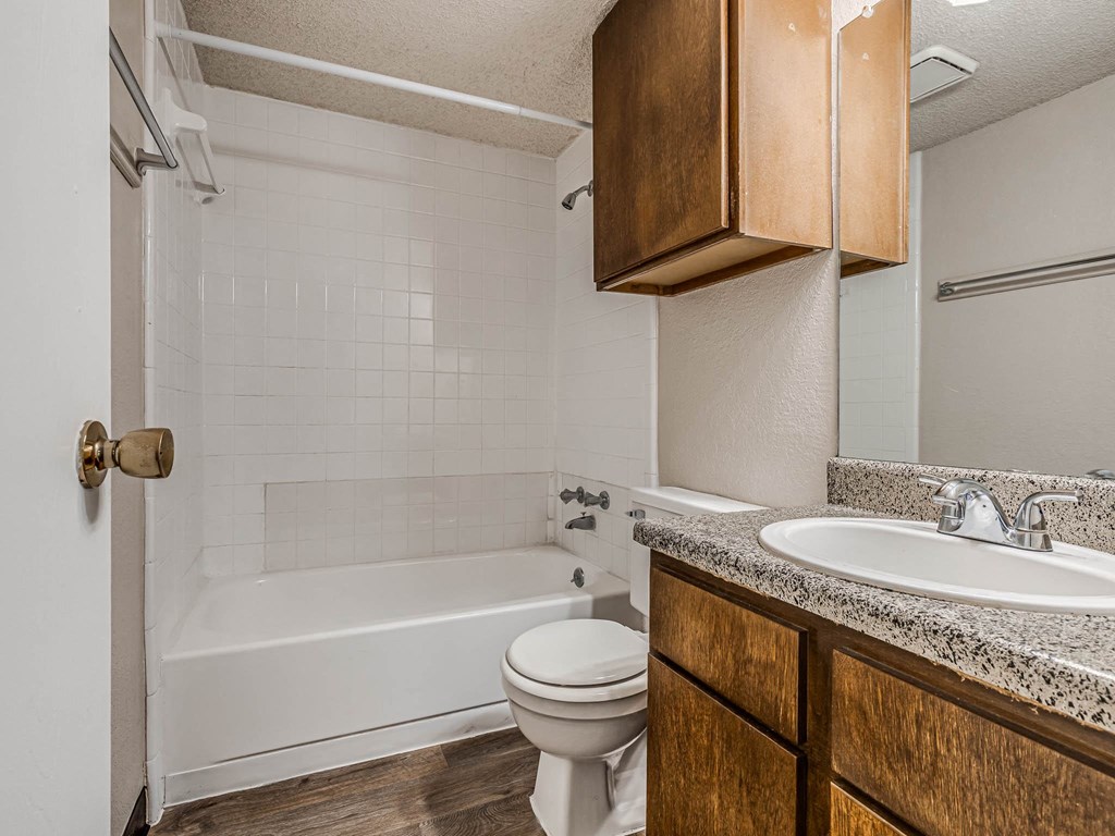 Bathroom With Granite Vanities