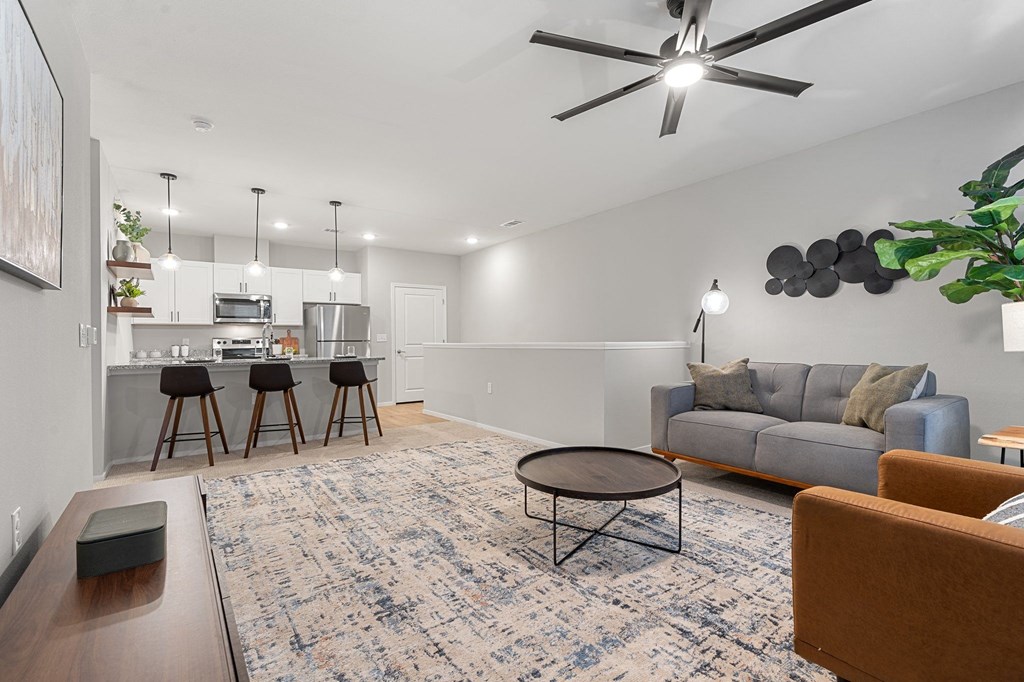 Spacious Living Area With Wood-Style Flooring