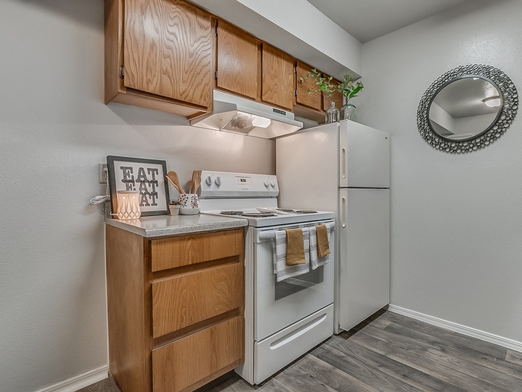 Kitchen Featuring White Appliances