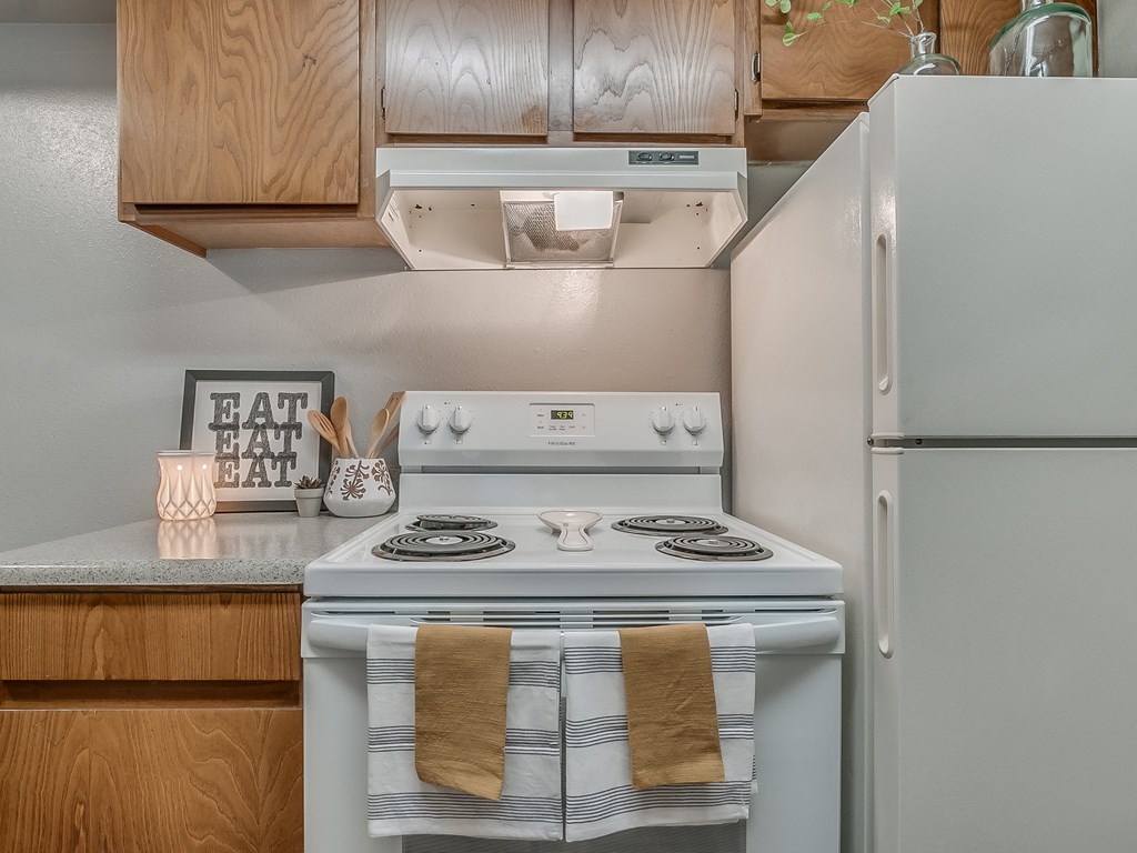 Kitchen Featuring White Appliances