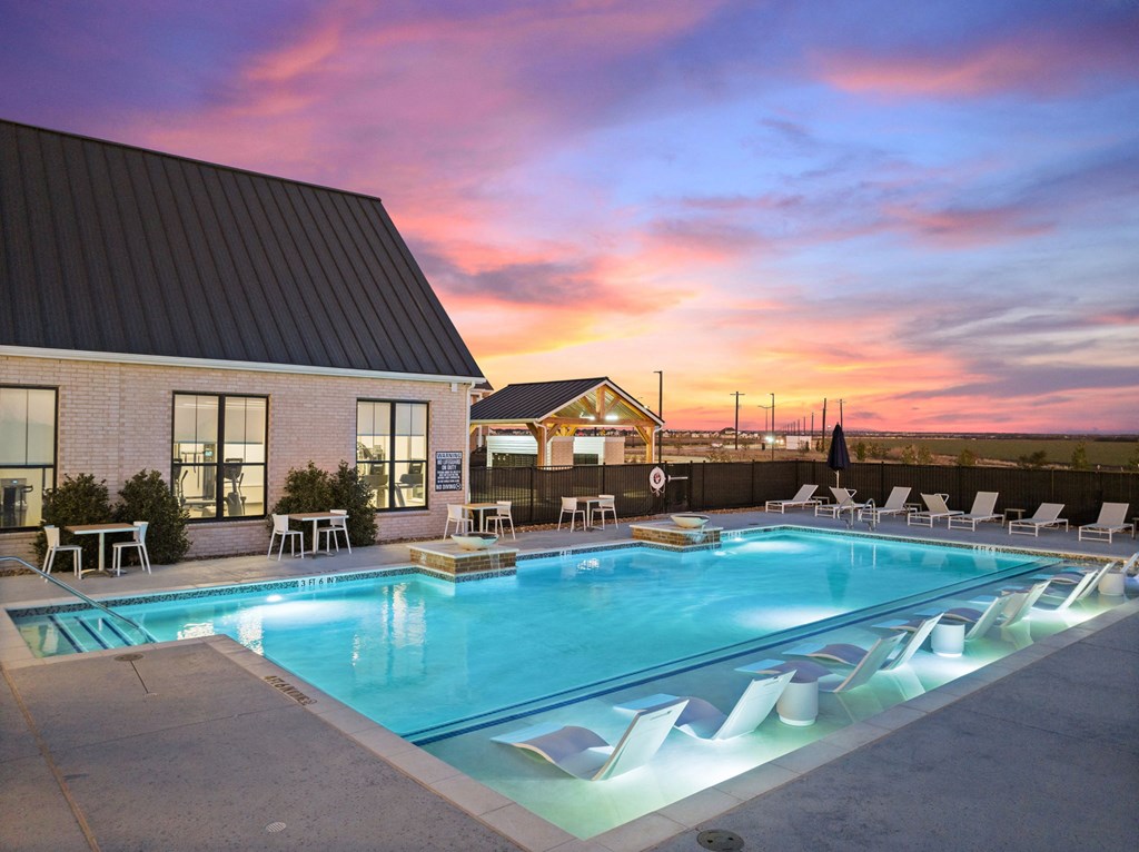 Twilight view of pool