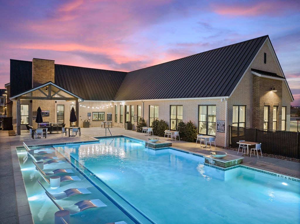 Twilight view of pool