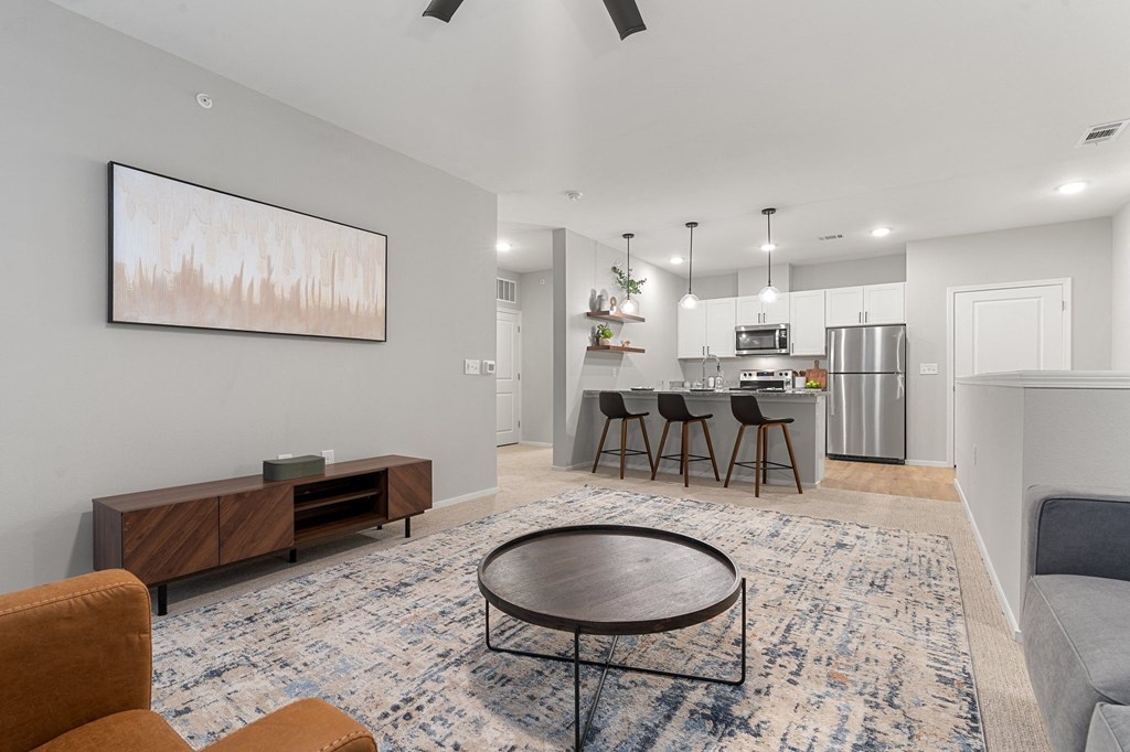 Spacious Living Area With Wood-Style Flooring