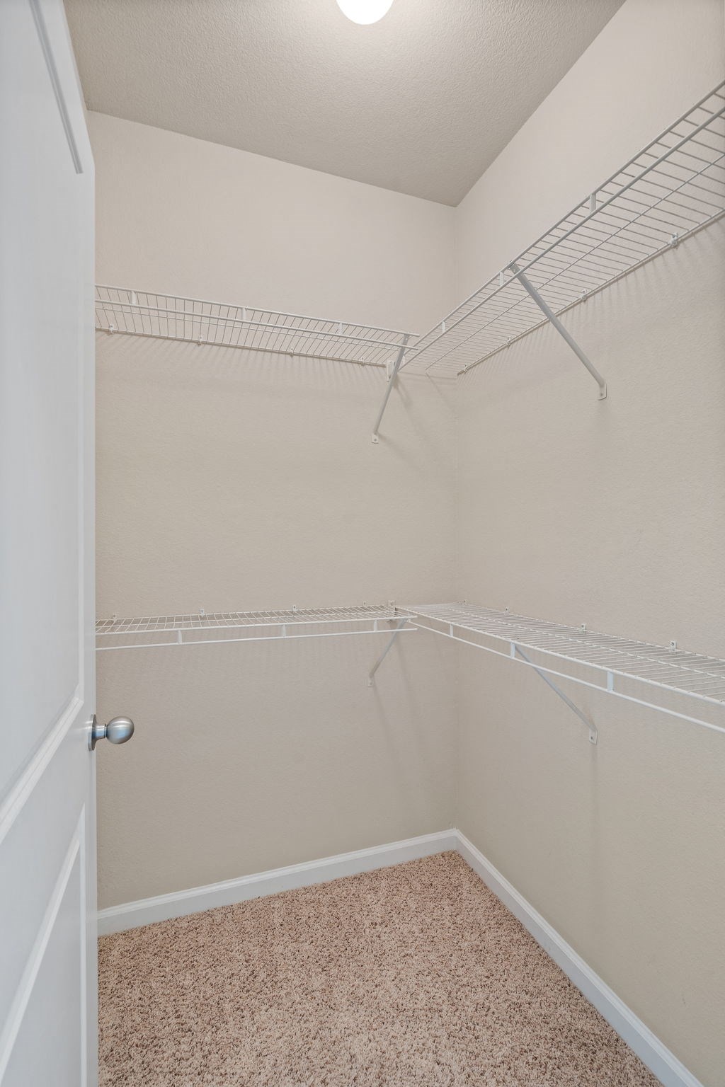 Walk-In Closet With Built-In Shelving