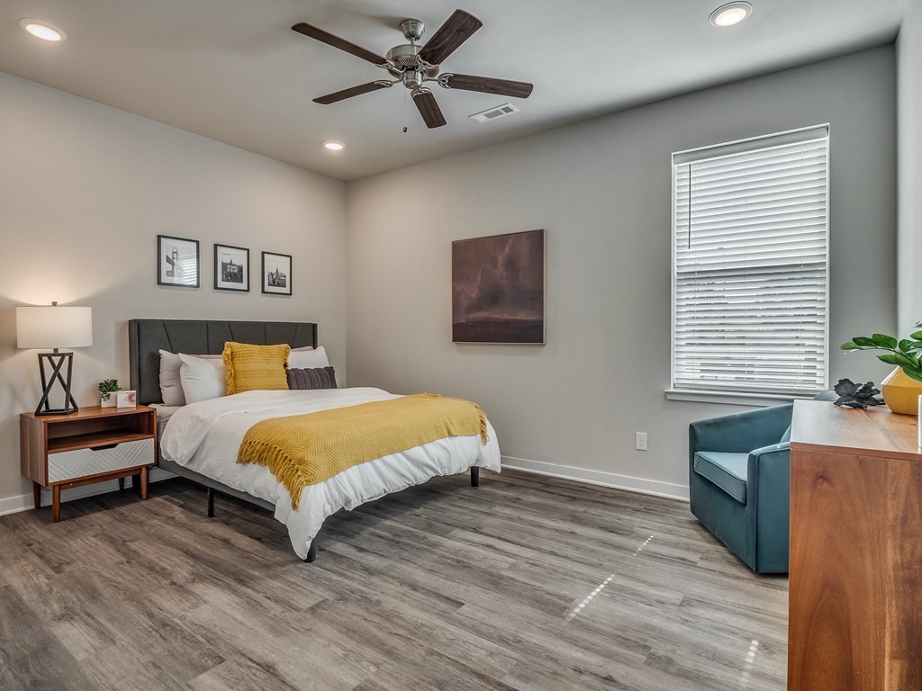 Large Bedroom with Wood-Style Flooring