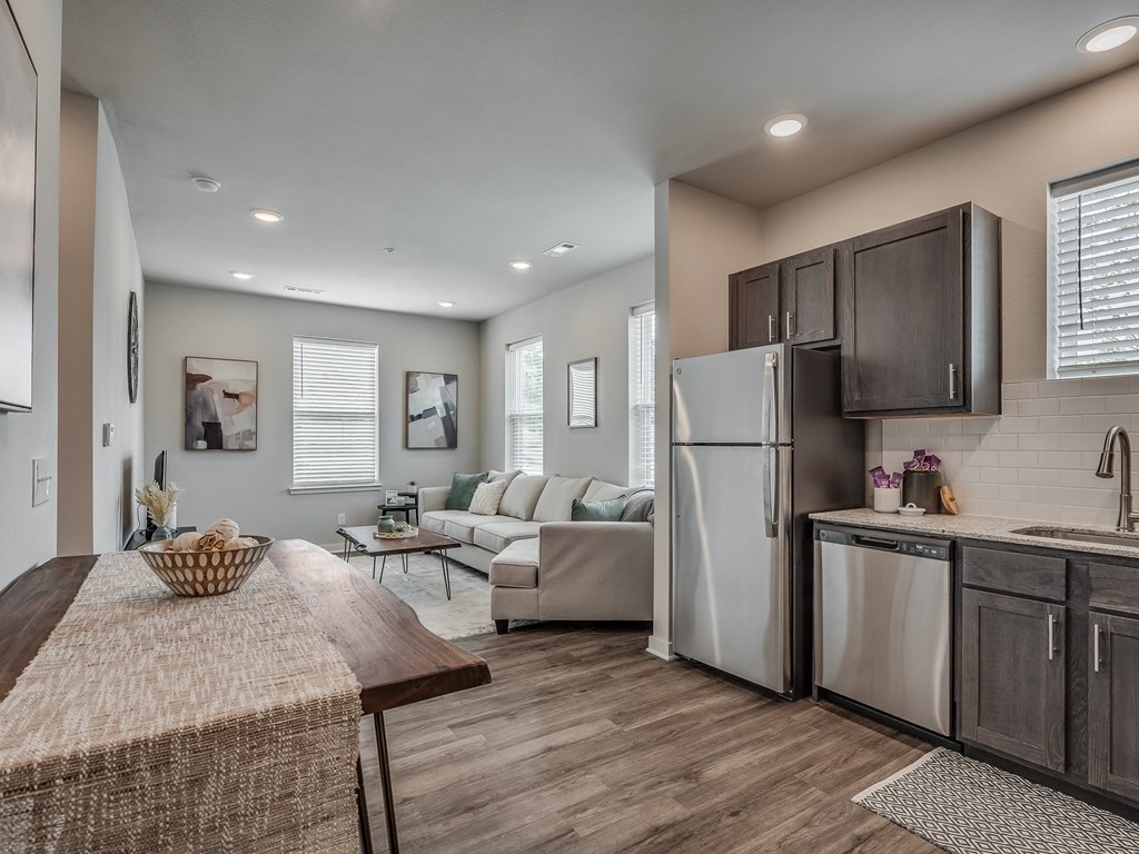 Spacious Living Area With Wood-Style Flooring