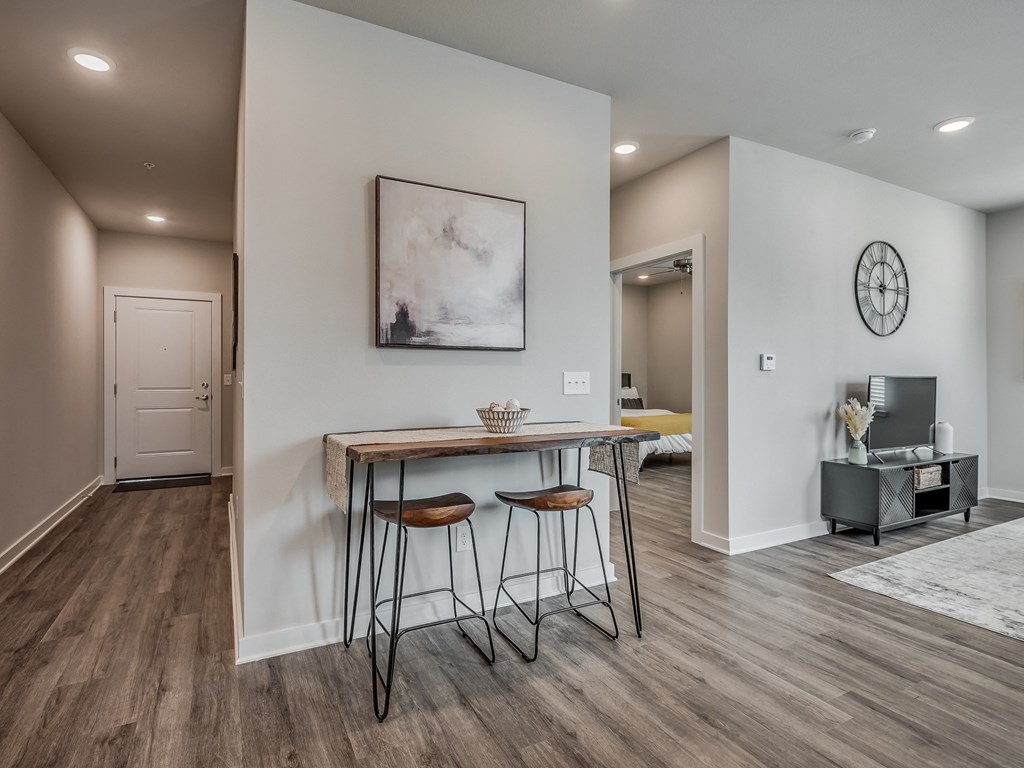 Spacious Living Area With Wood-Style Flooring