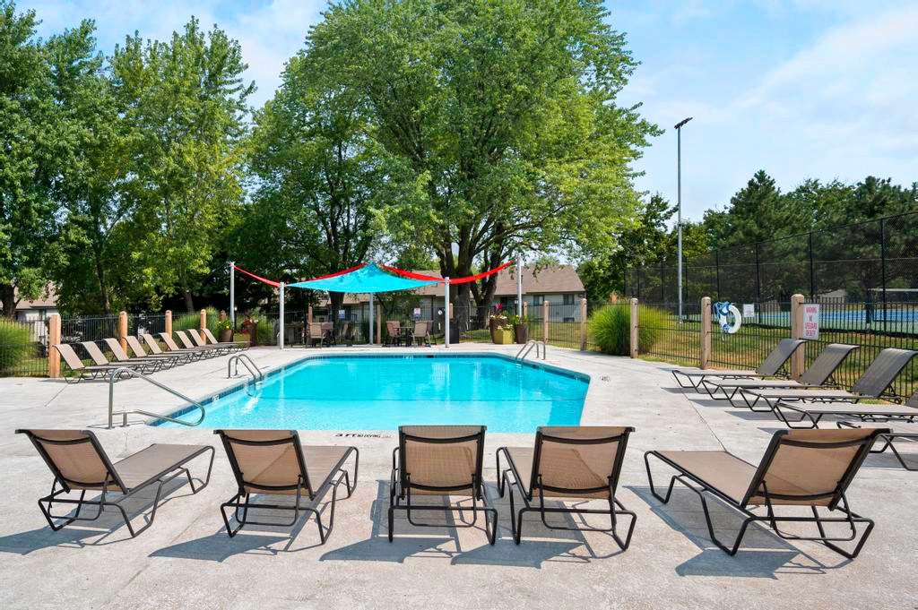 Pool & Sundeck With Lounge Chairs
