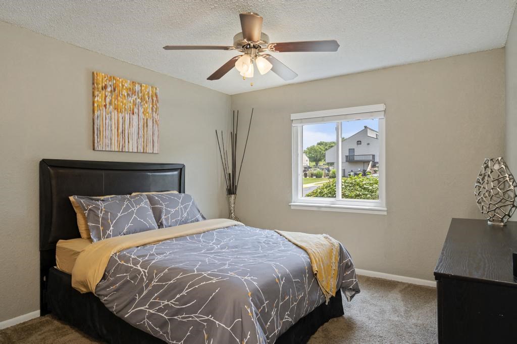 Bedroom With Ceiling Fan & Light