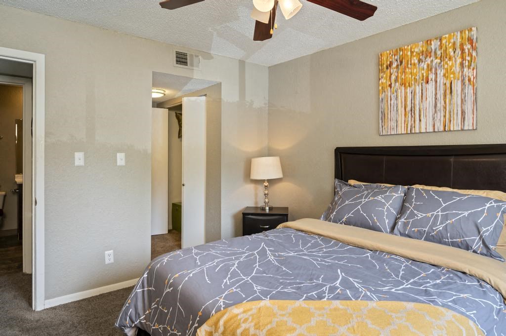 Spacious Bedroom With Plush Carpeting