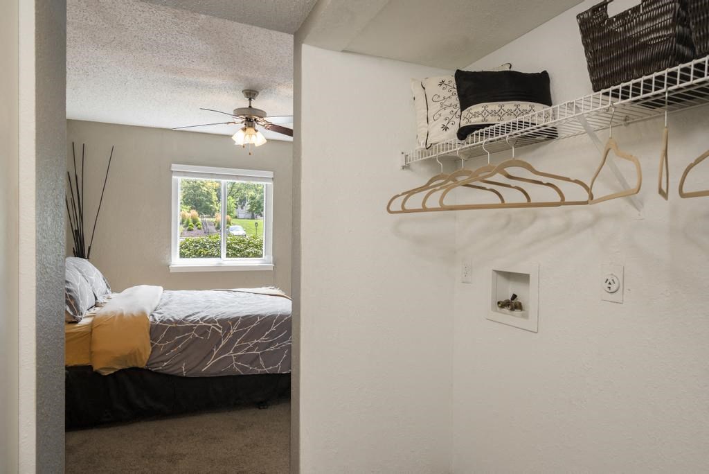 Open Closet With Washer & Dryer Connection