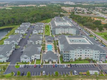 Aerial View Of Thrive Apartment Community With  Ample Parking