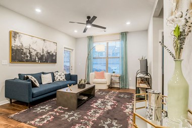 Spacious Living Area with Hardwood-Style Flooring