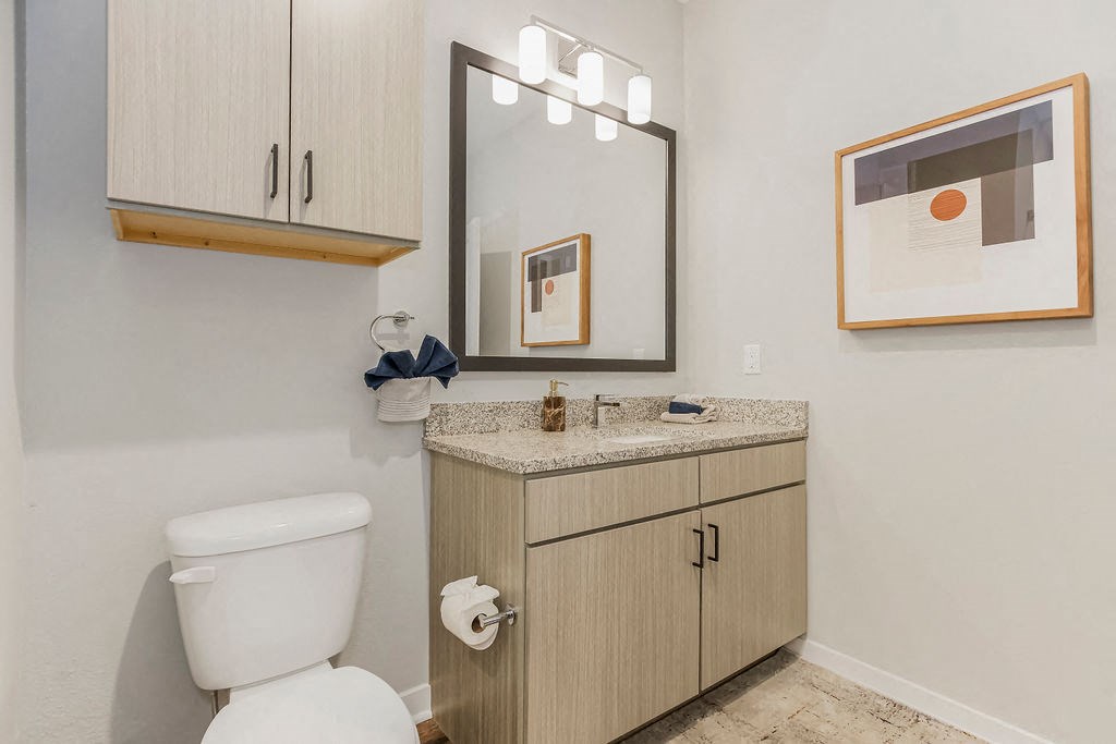Bathroom With Granite Vanities