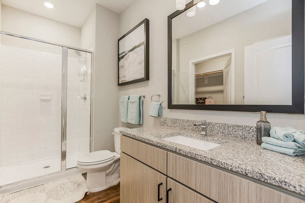 Bathroom With Granite Vanities