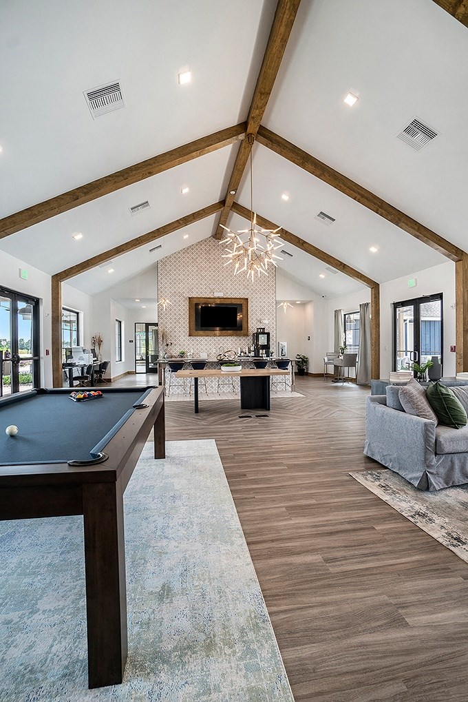 Clubhouse Kitchen & Lounge Featuring A Pool Table