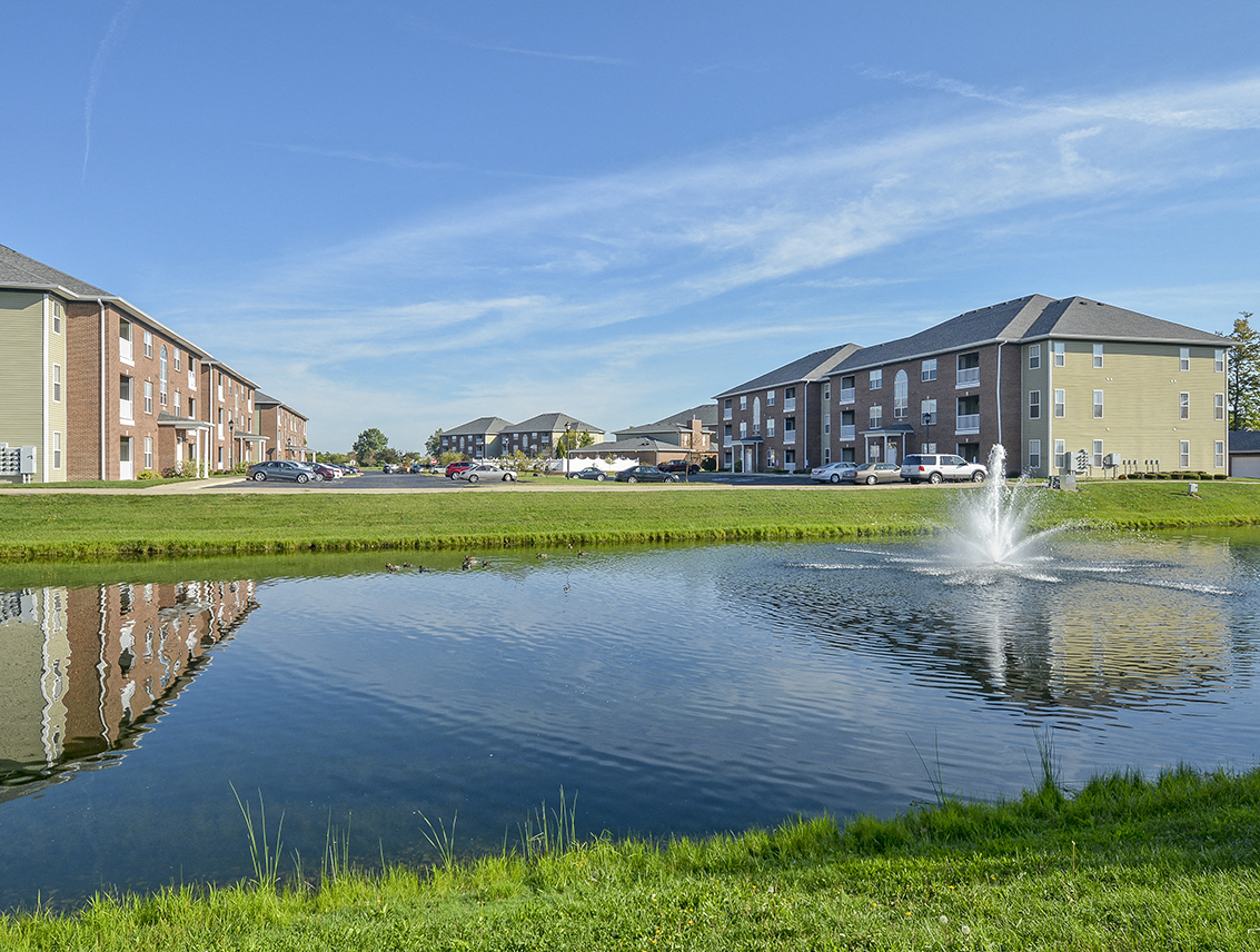 Towne Park Apartment Homes next to the Large Pond with Fountain