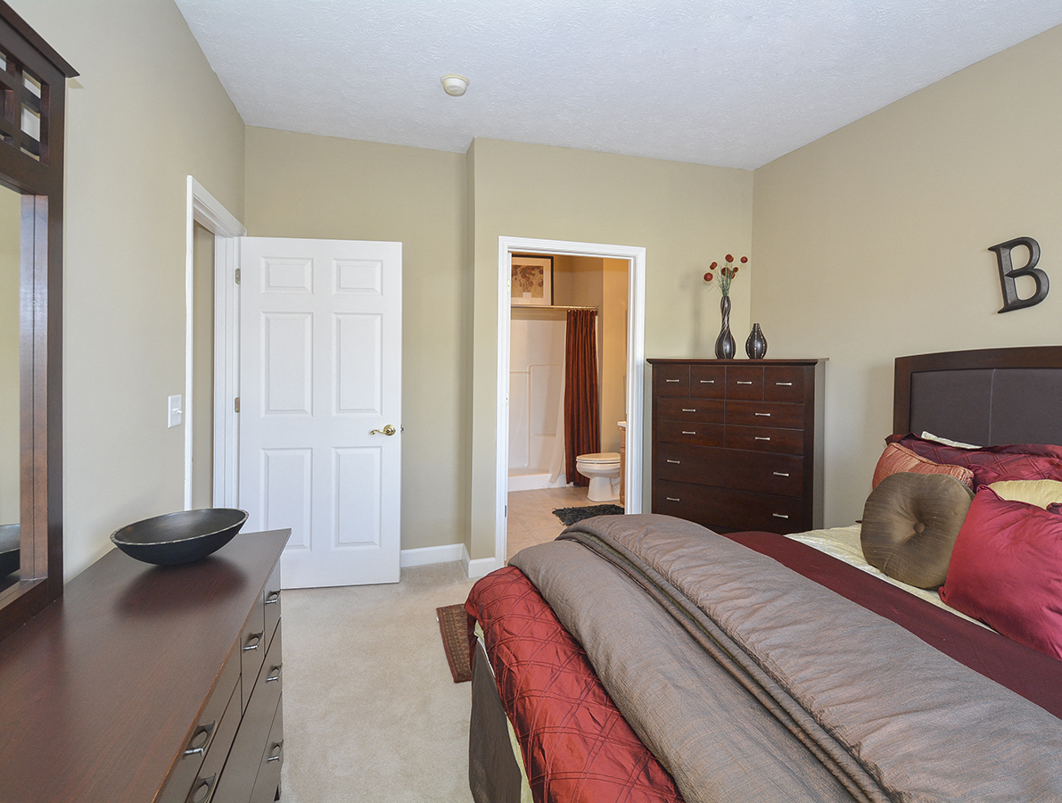 Carpeted Bedroom with Attached Bathroom