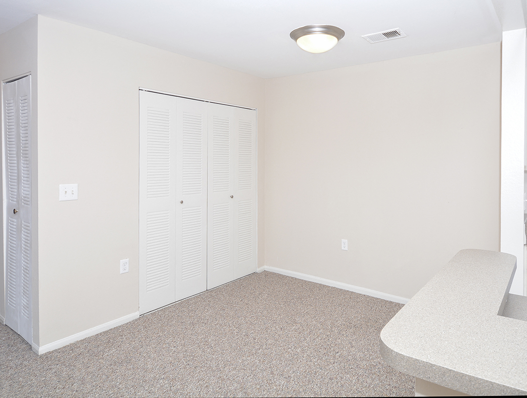 Dining Room Area with Accordion Style Closet