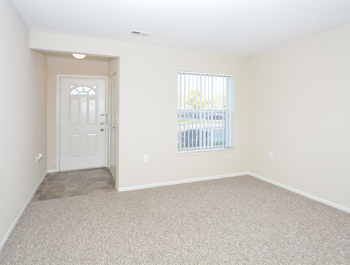 Apartment Home Entry Way with Closet and Tile Style Flooring