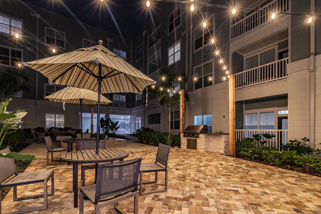 Outdoor Pool Sundeck Lit Up At Night