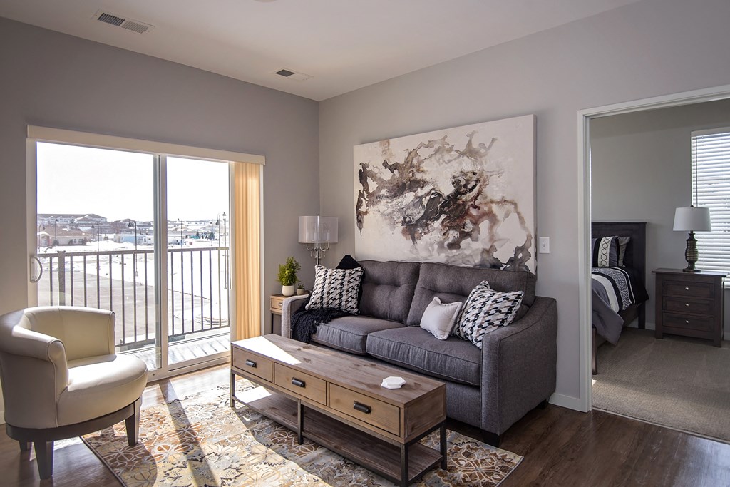 Living Room with Wood Style Flooring and Tall Ceilings