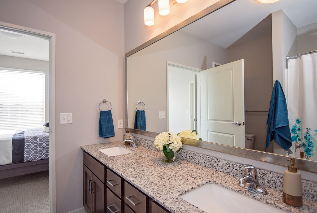 Spacious Bathroom Leading to an Attached Bedroom