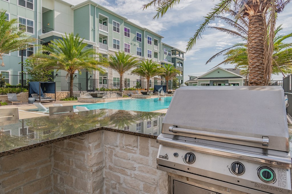 Outdoor Grill Area Overlooking The Pool & Sundeck