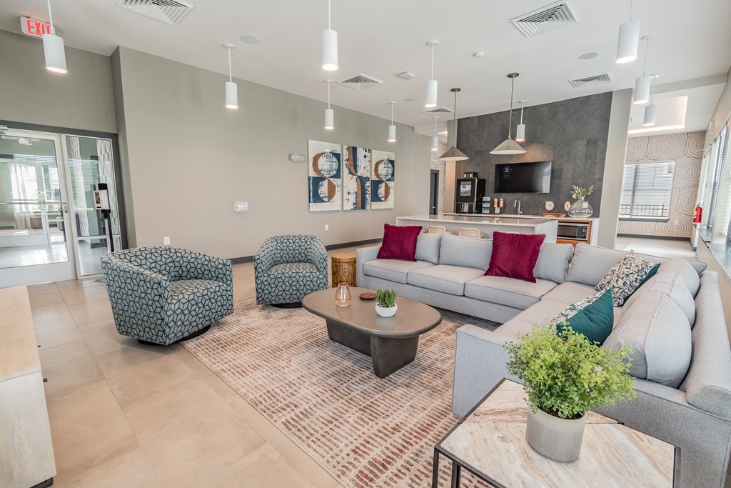 Clubhouse Lounge Area With Couch & Chairs