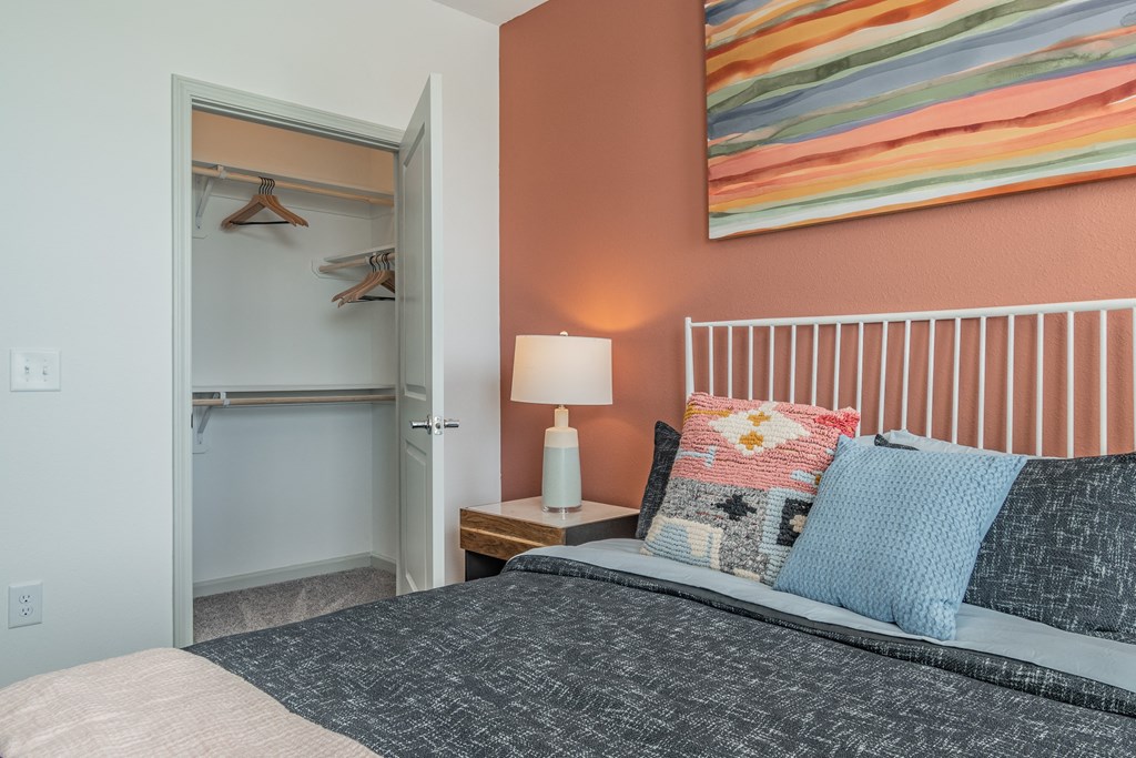 Bedroom With Door Leading To Closet