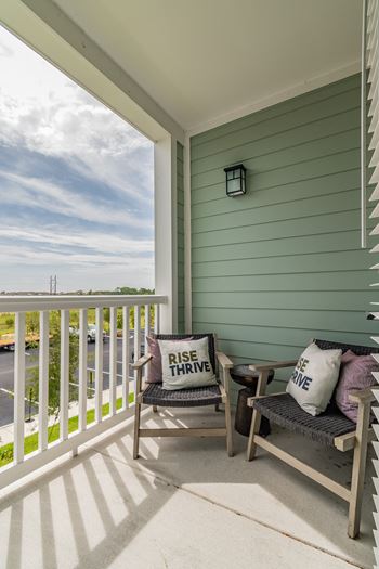 Covered Balcony With Sitting Area