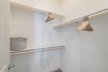 Walk-In Closet With Built-In Shelving