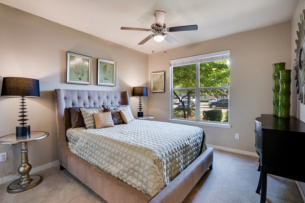 Bedroom with Double Windows and Ceiling Fan