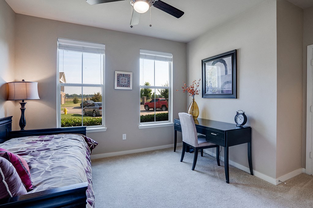 Spacious Bedroom with Windows that Let In Lots of Natural Light