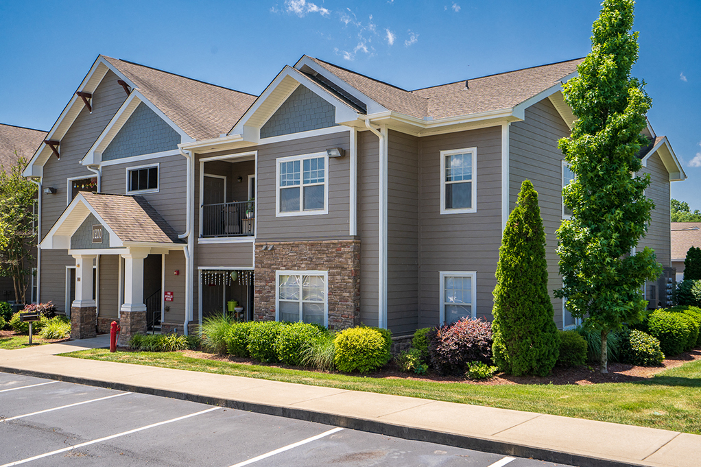 Lush Landscaping and Greenery in Front of Building 1200 at The Falls at 109