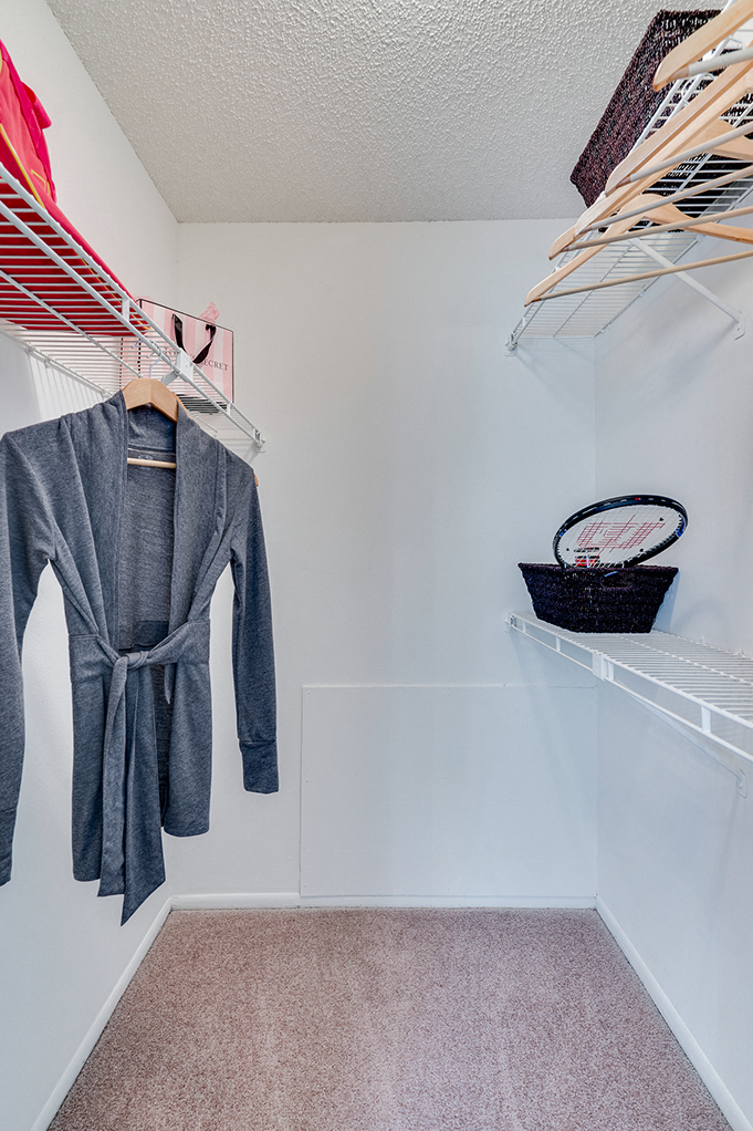 Spacious Walk In Closet with Lots of Shelving