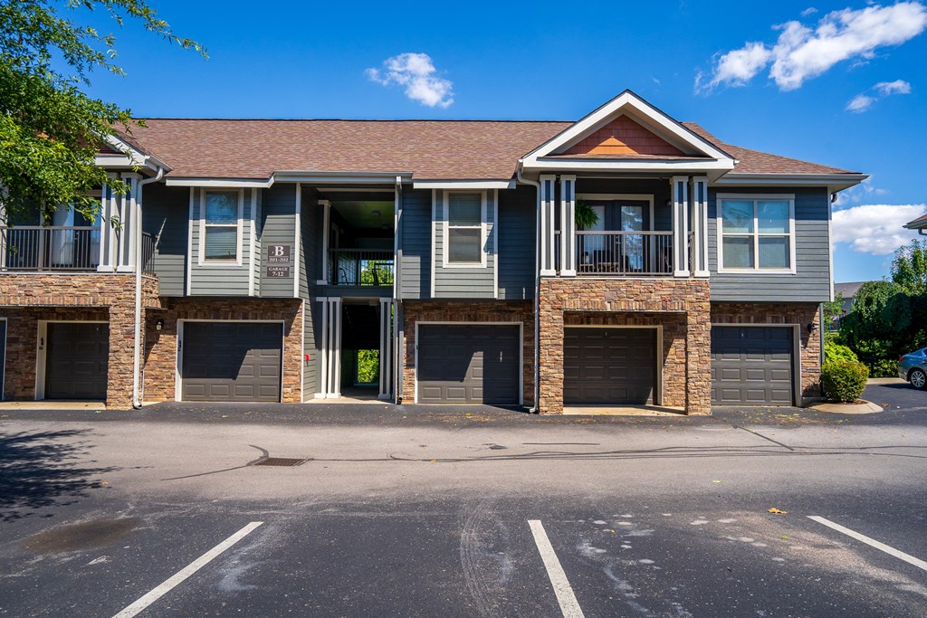 Exterior Of Apartment Homes With Garage Parking Beneath