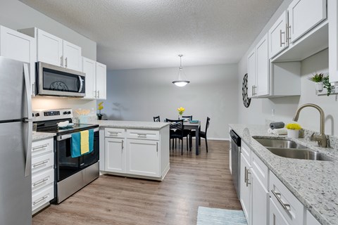 Kitchen Featuring Vinyl Wood-Style Flooring