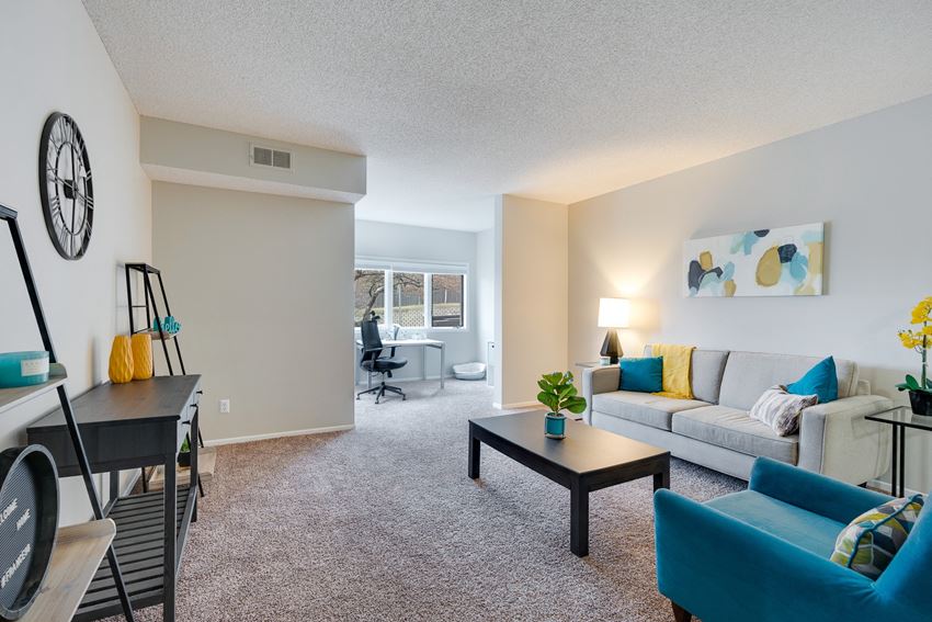 Spacious Living Room With Partial Walls To Den Area - Photo Gallery