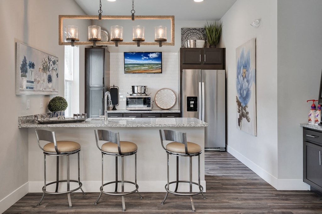 Clubhouse Kitchen With Stainless Steel Appliances & Granite Counters