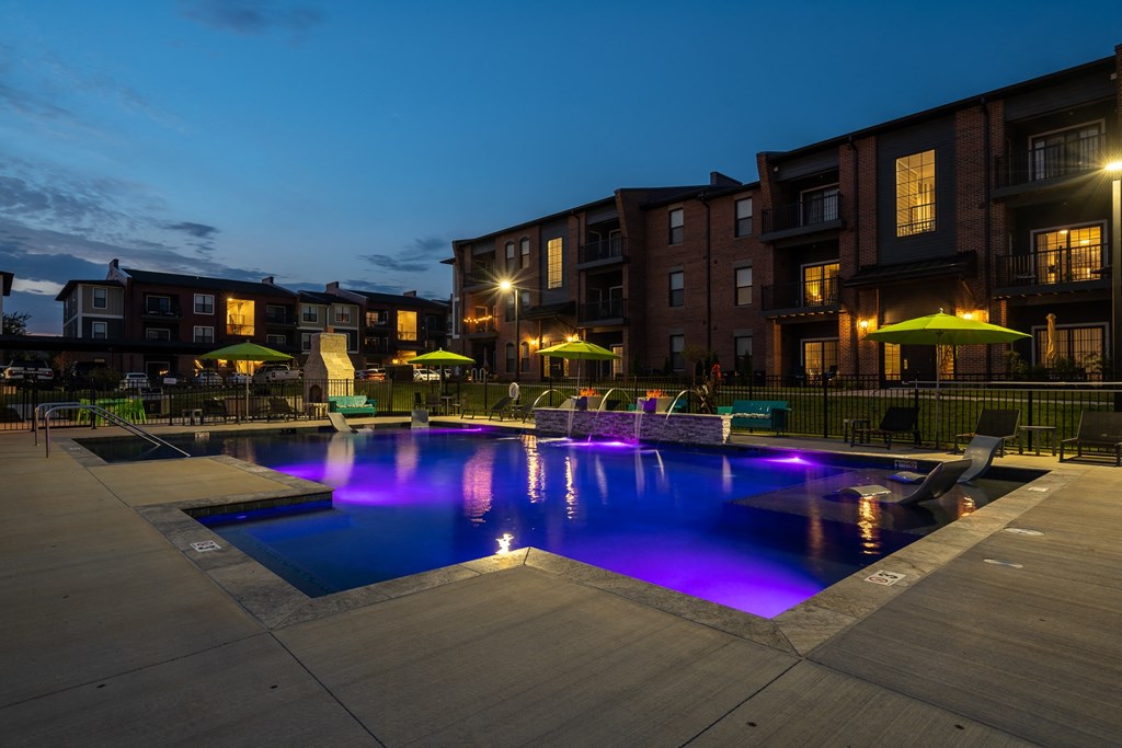 Resort-Style Pool & Sundeck At Night