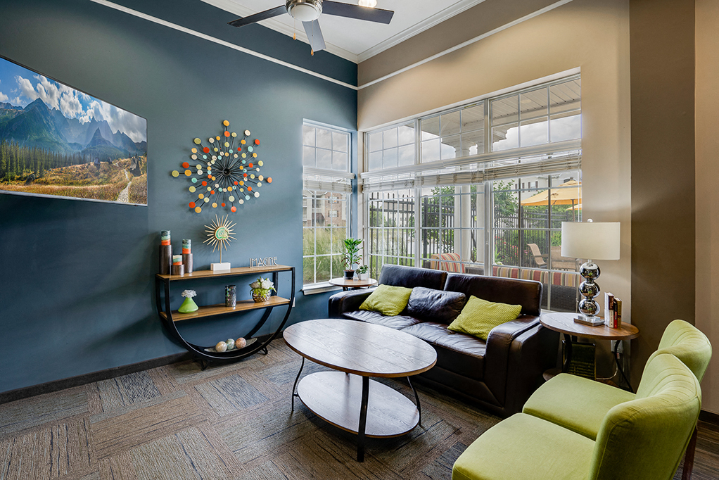a living room with a couch and a table