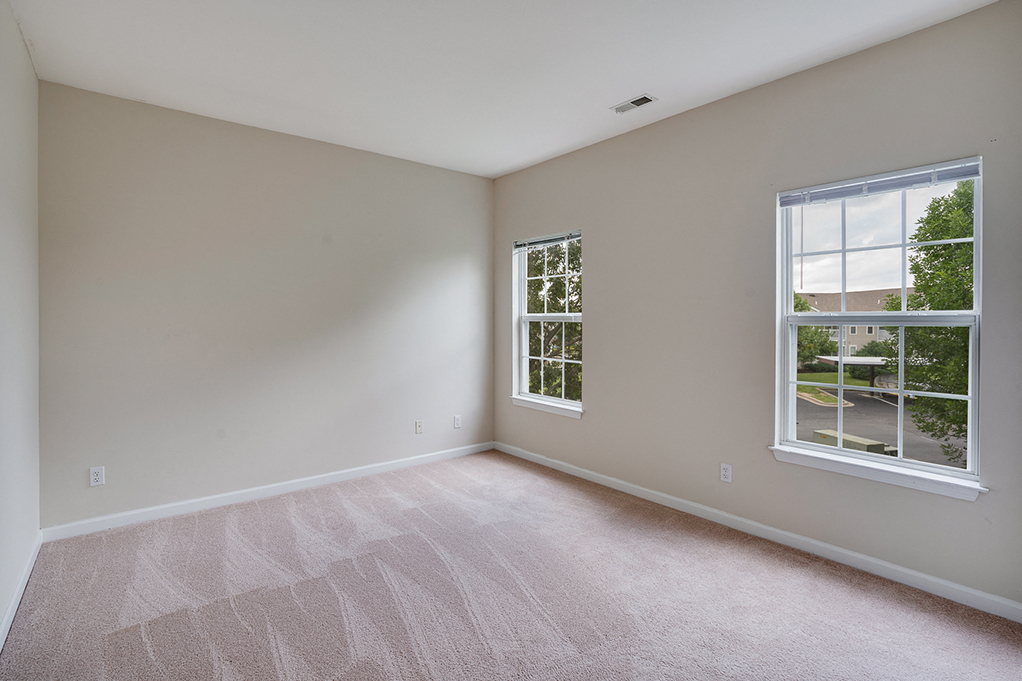 Bedroom with Two Large Windows