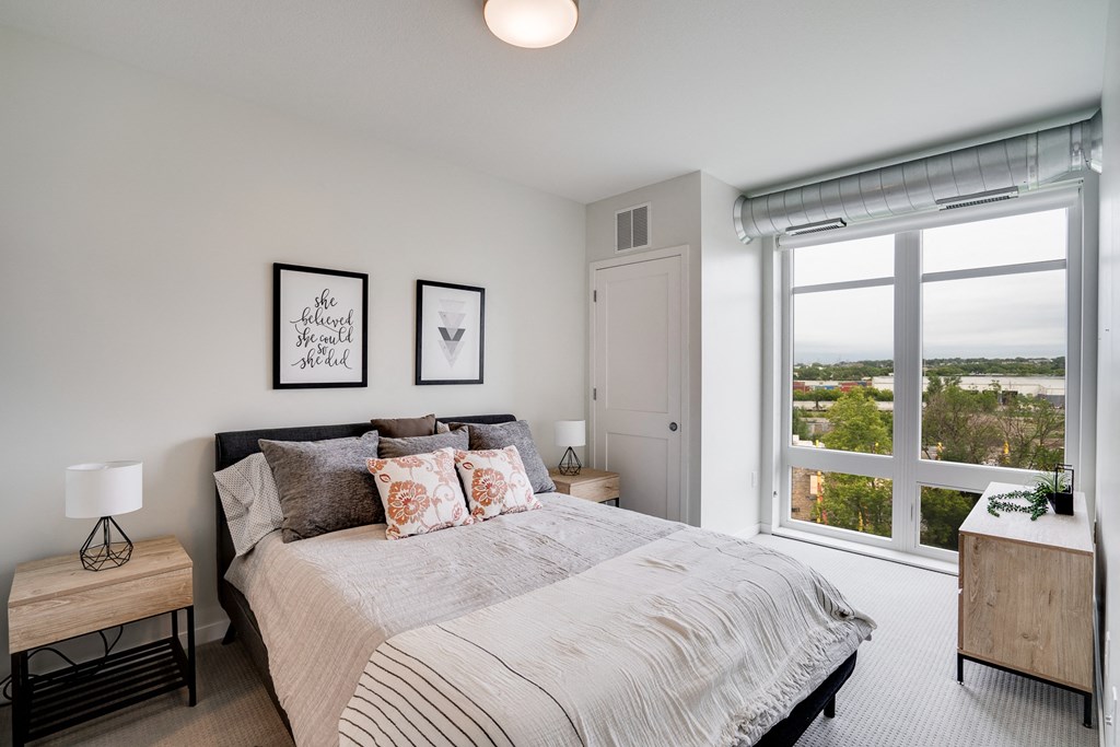 Large Floor to Ceiling Windows in Bedroom