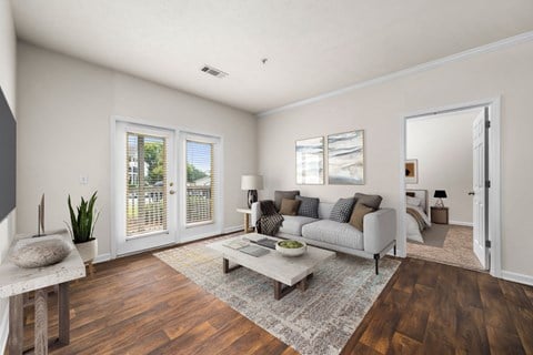 Spacious Living Area With Wood-Style Flooring